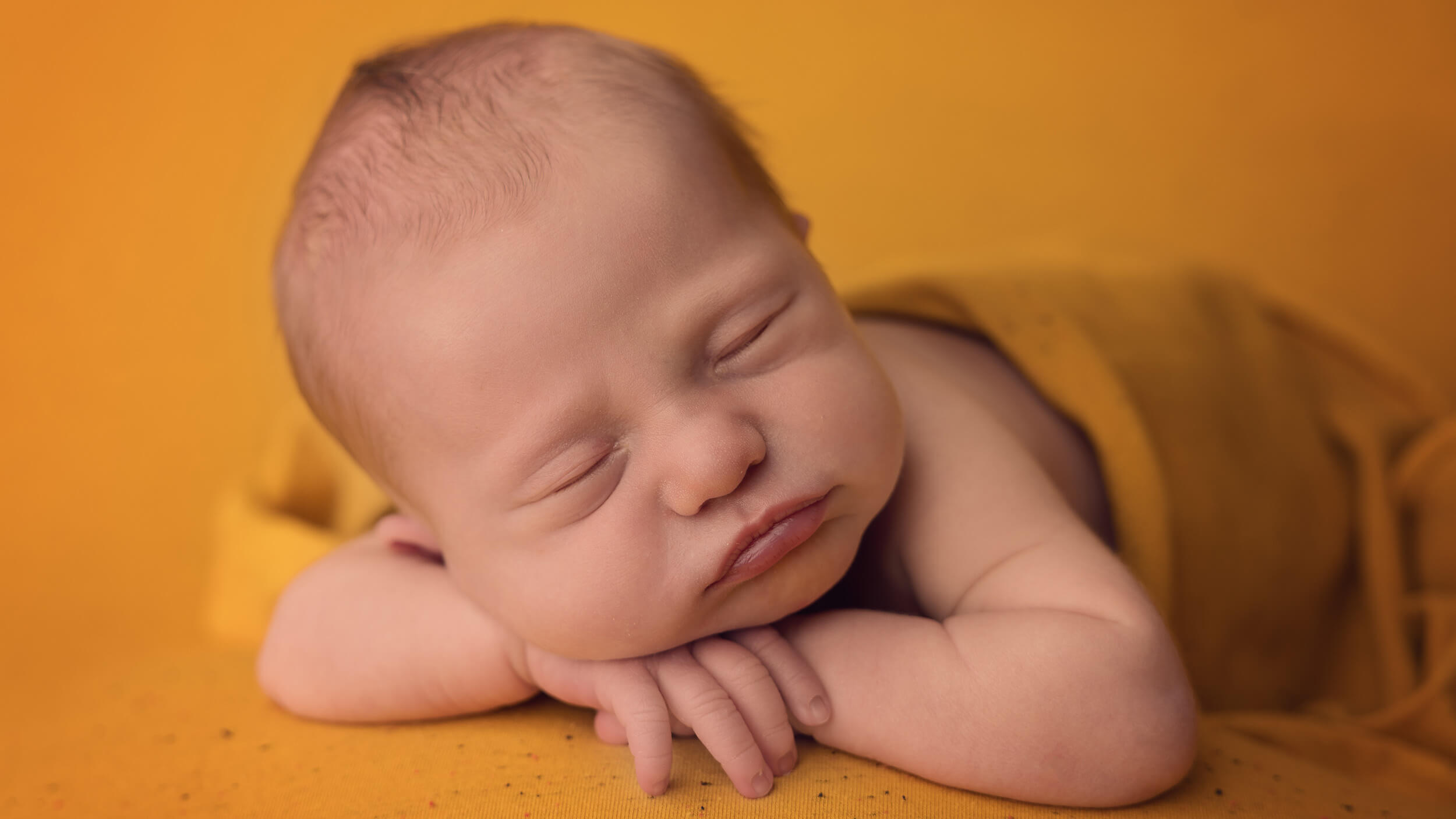 Sleeping newborn baby at AnA Photography's studio in Cornwall.